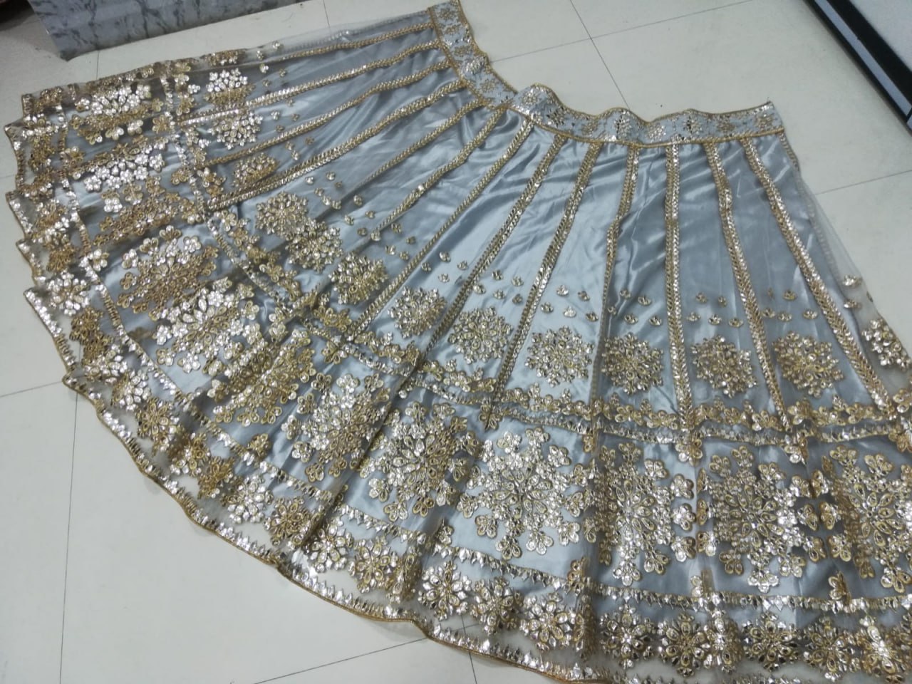 ELEGANT GRAY NET LEHENGA CHOLI SET WITH PAPER MIRROR EMBROIDERY WORK