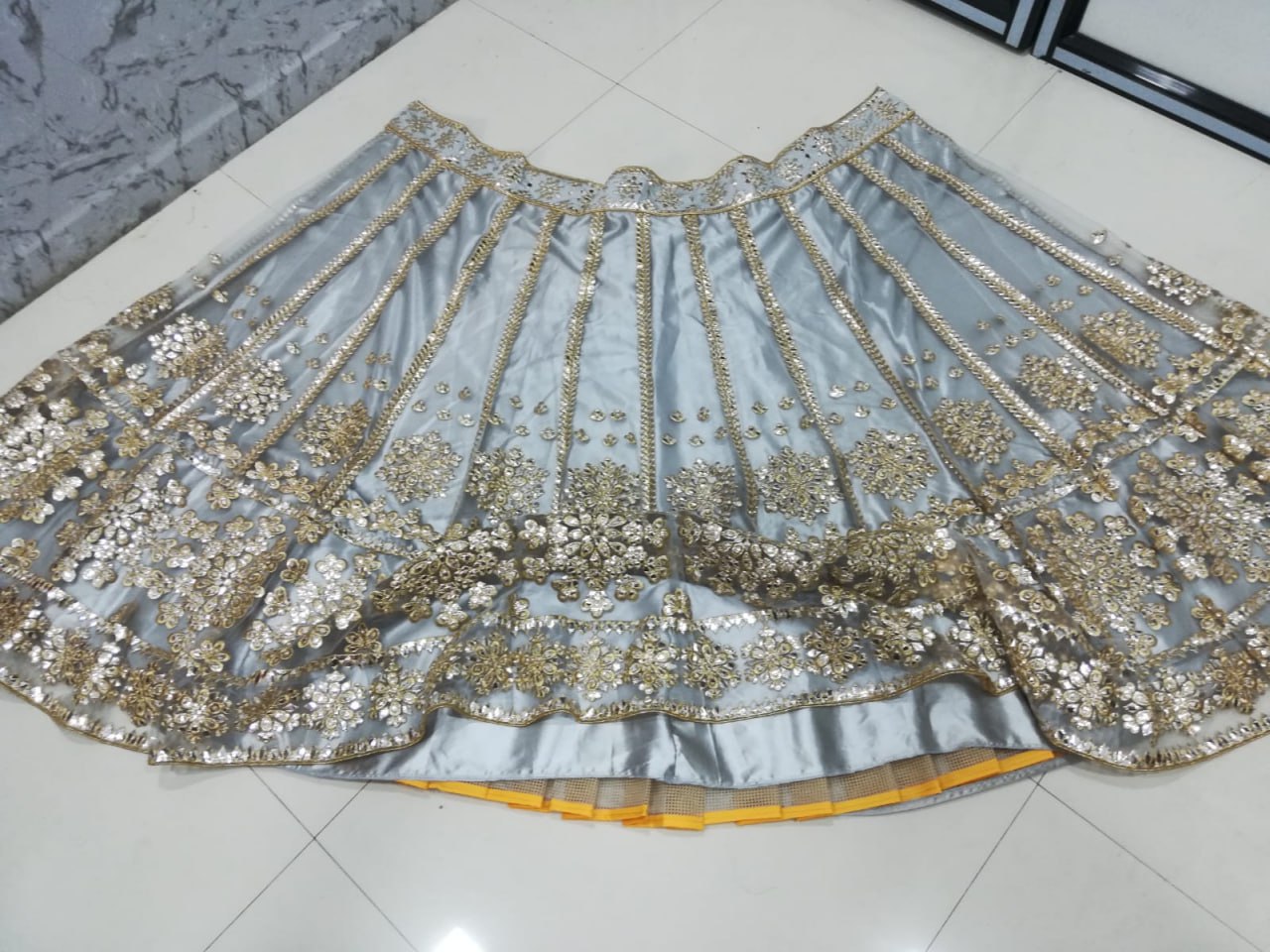 ELEGANT GRAY NET LEHENGA CHOLI SET WITH PAPER MIRROR EMBROIDERY WORK