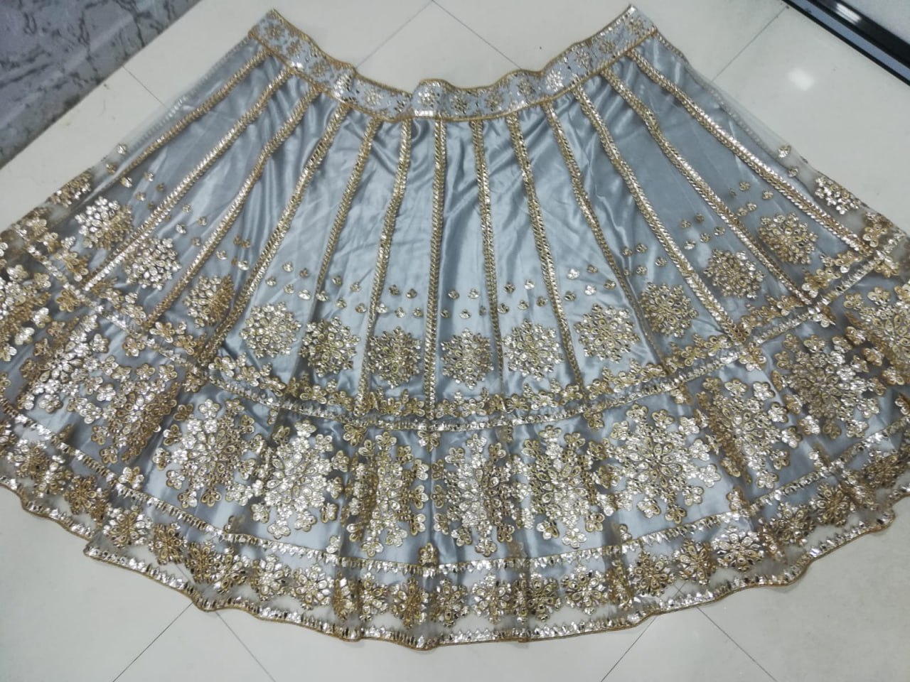 ELEGANT GRAY NET LEHENGA CHOLI SET WITH PAPER MIRROR EMBROIDERY WORK