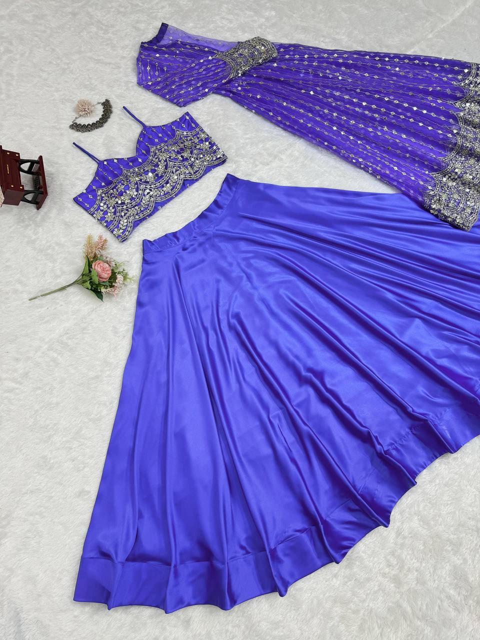 GRACEFUL JAPAN SATIN LEHENGA WITH BUTTERFLY NET CHOLI & KOTI