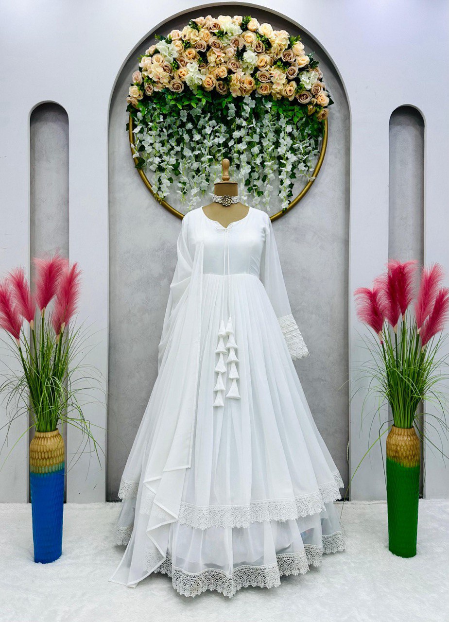 ELEGANT DESIGNER GOWN IN FAUX GEORGETTE WITH LACE WORK & TASSELS – A PERFECT BLEND OF GRACE & STYLE