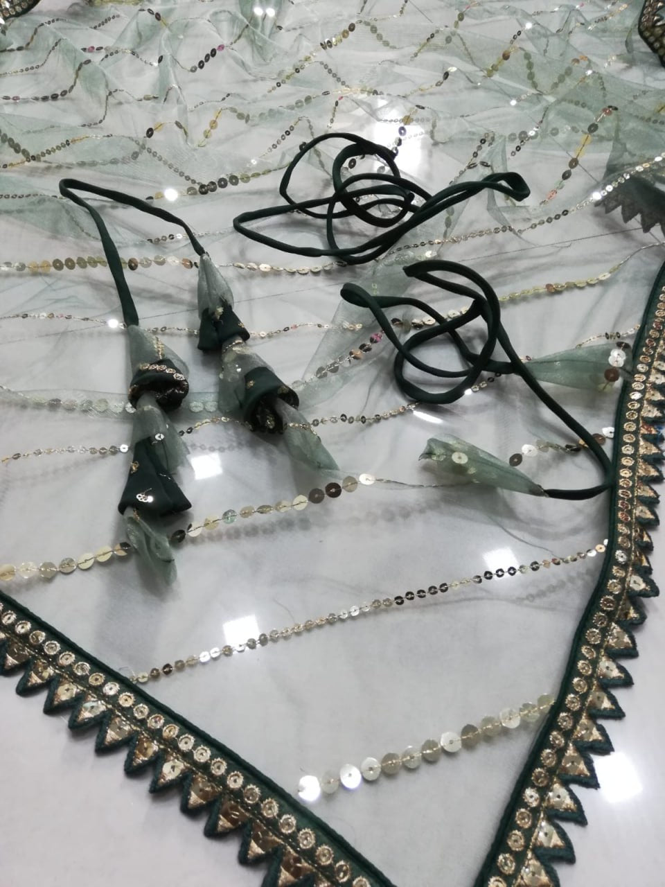 BOTTLE GREEN FAUX GEORGETTE DESIGNER LEHENGA SET WITH MULTI-SIZE SEQUINS & JARI EMBROIDERY