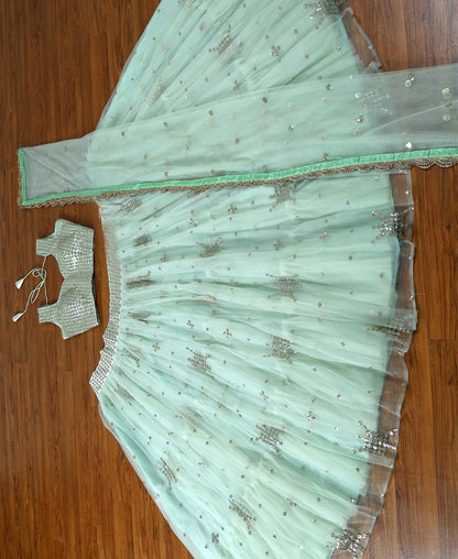 PREMIUM HEAVY BUTTERFLY NET LEHENGA CHOLI WITH SEQUENCE WORK & RUFFLE FLAIR