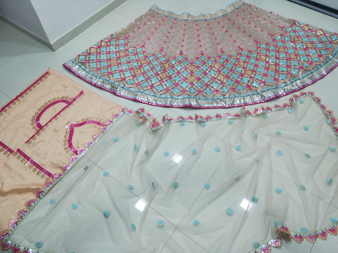 PREMIUM BUTTERFLY NET LEHENGA CHOLI WITH MULTI-THREAD & FOIL MIRROR EMBROIDERY