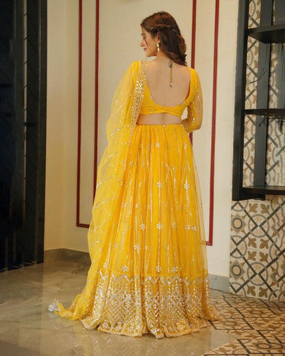 PREMIUM HEAVY BUTTERFLY NET LEHNGA CHOLI WITH 9MM SEQUENCE AND ZARI EMBROIDERY