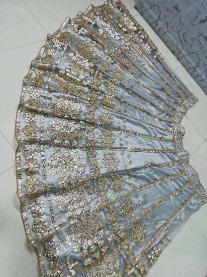 ELEGANT GRAY NET LEHENGA CHOLI SET WITH PAPER MIRROR EMBROIDERY WORK