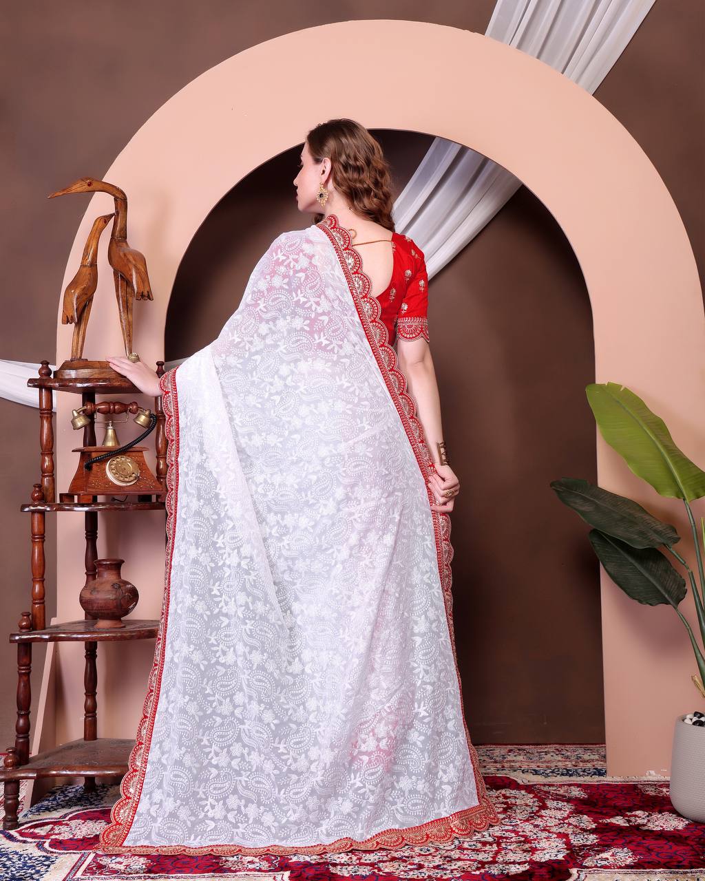 ELEGANT SOFT GEORGETTE SAREE WITH EXQUISITE CHIKANKARI JAAL EMBROIDERY & CONTRASTING RED BLOUSE