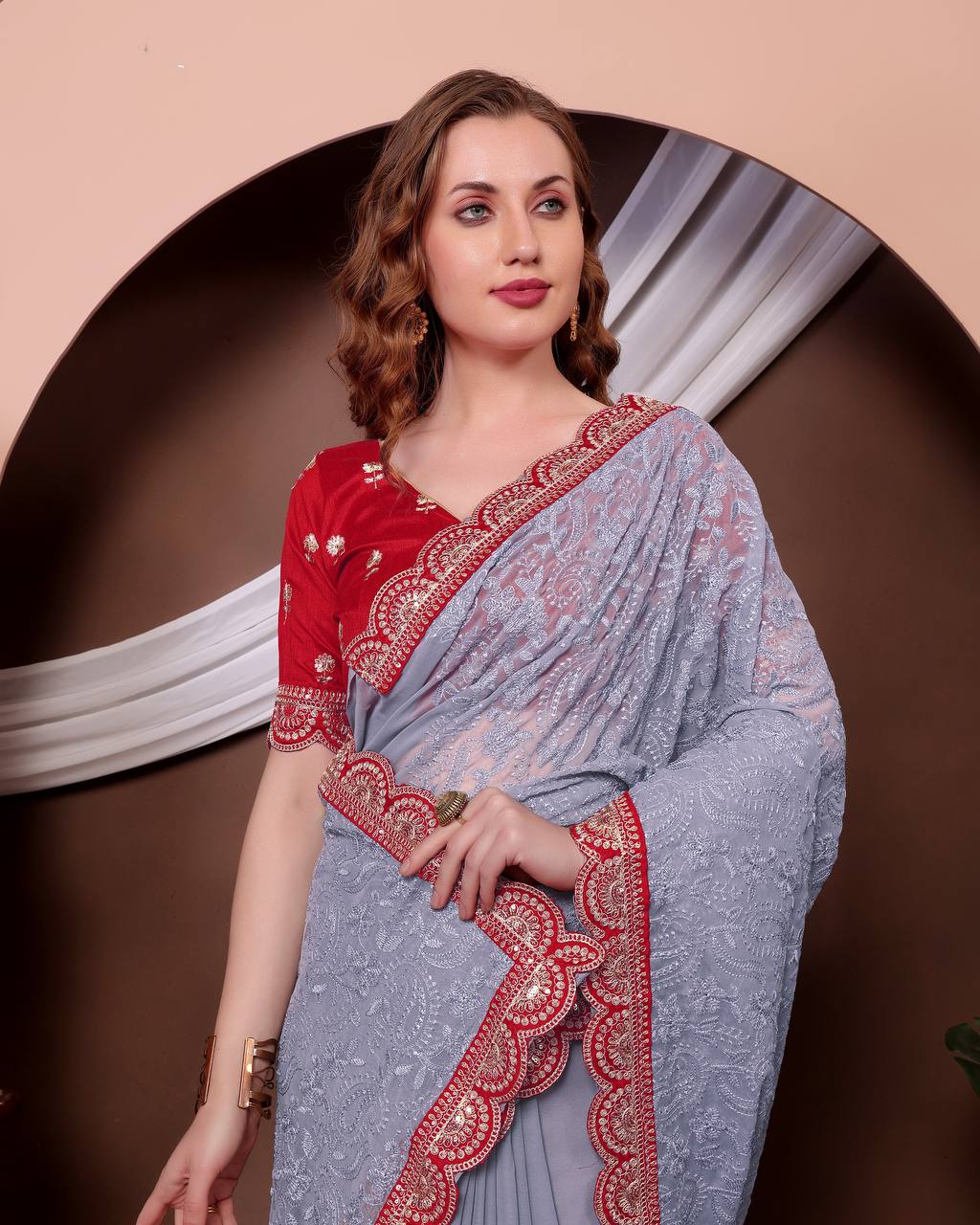 ELEGANT SOFT GEORGETTE SAREE WITH EXQUISITE CHIKANKARI JAAL EMBROIDERY & CONTRASTING RED BLOUSE