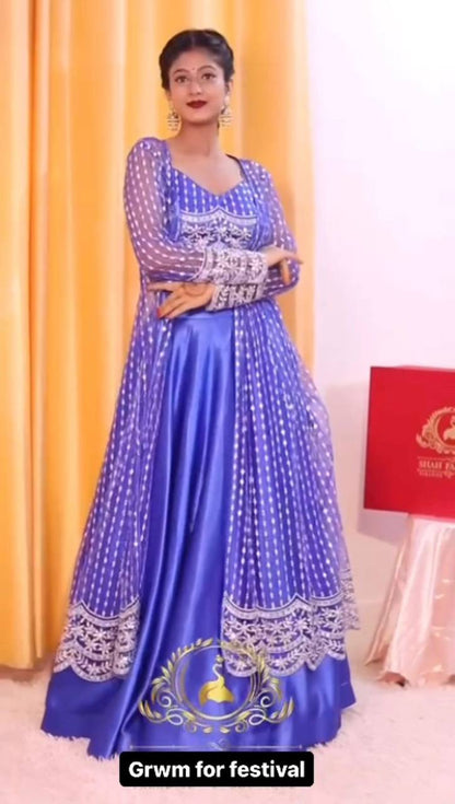 GRACEFUL JAPAN SATIN LEHENGA WITH BUTTERFLY NET CHOLI & KOTI