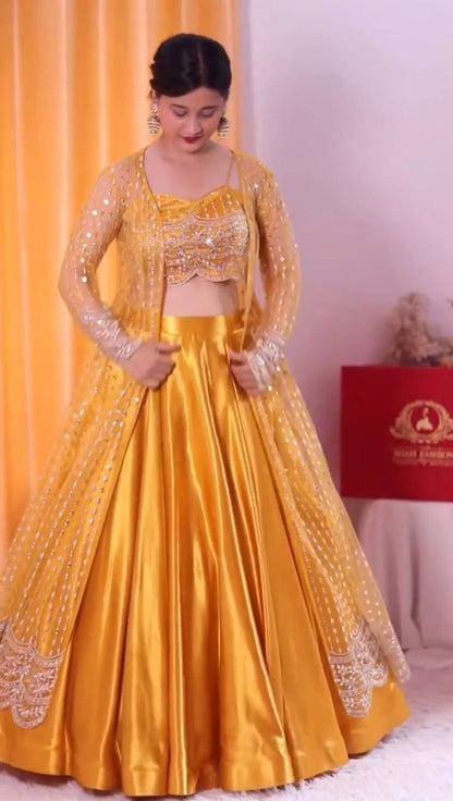 GRACEFUL JAPAN SATIN LEHENGA WITH BUTTERFLY NET CHOLI & KOTI