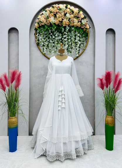 ELEGANT DESIGNER GOWN IN FAUX GEORGETTE WITH LACE WORK & TASSELS – A PERFECT BLEND OF GRACE & STYLE
